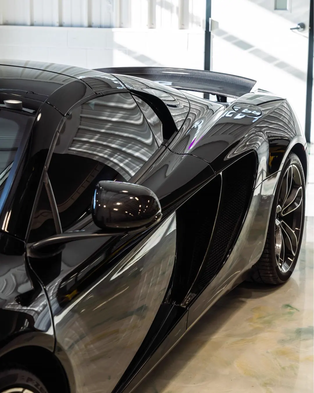 A McLaren MP4 with KAVACA Ceramic IR window tint.